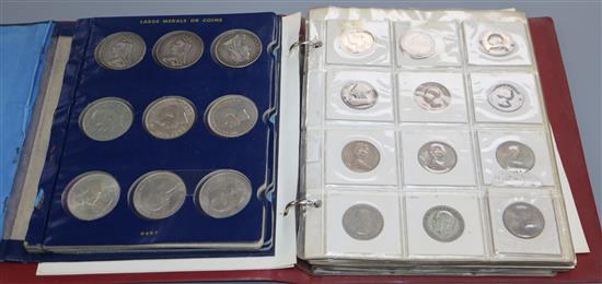 A collection of UK silver and cupro-nickel coinage, florins to crowns, George III to Elizabeth II, Two albums